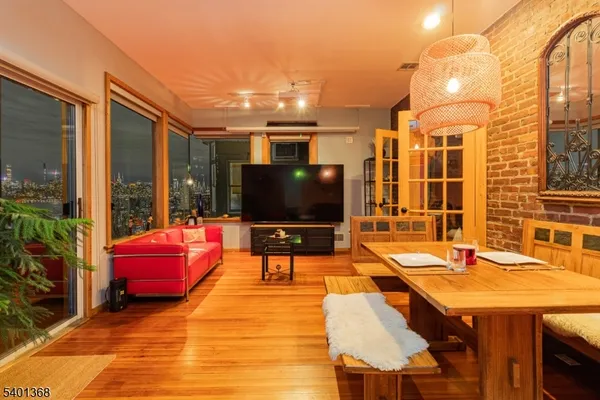 a outdoor living space with furniture and city view