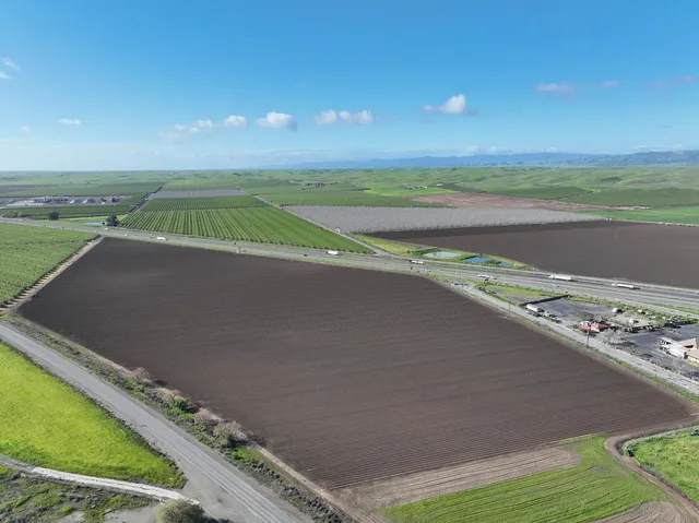 a view of an ocean and a yard