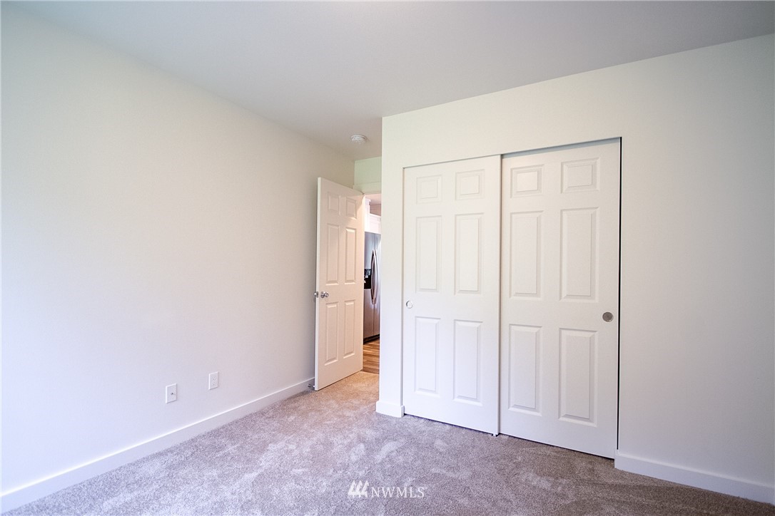 16716 Erickson Road Southwest Longbranch, WA 98351 - Photo 8 of 17 an empty room with closet area