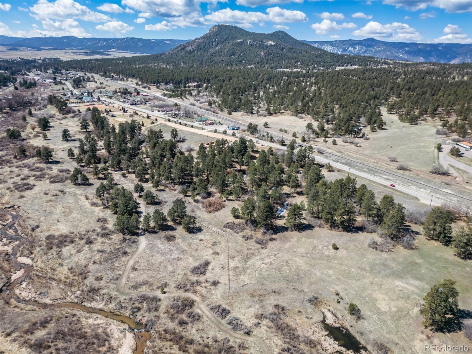 8650 Spruce Mountain Road Larkspur, CO 80118 - Photo 1 of 12 a view of ocean view