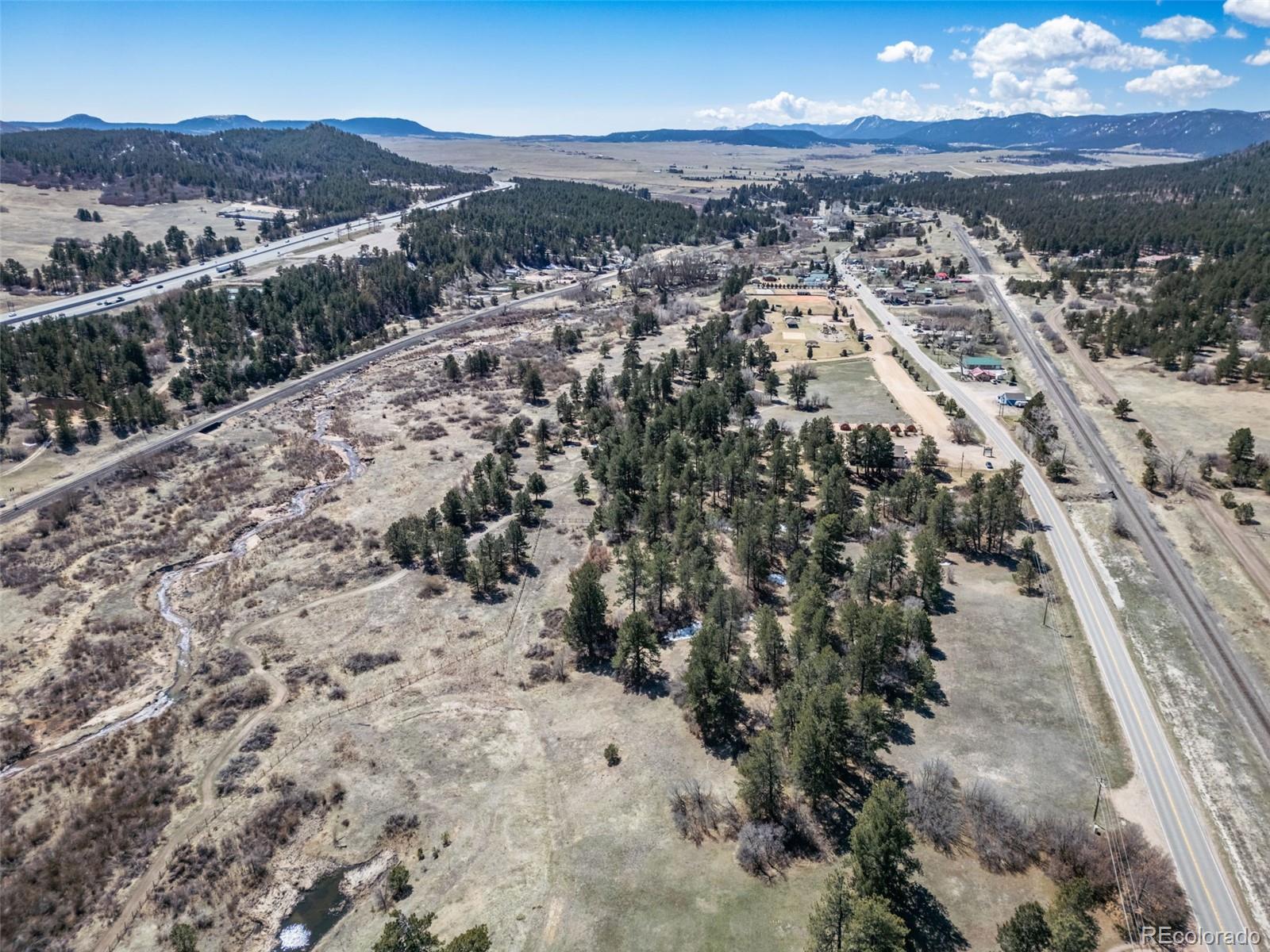 8650 Spruce Mountain Road Larkspur, CO 80118 - Photo 7 of 12 a view of a city