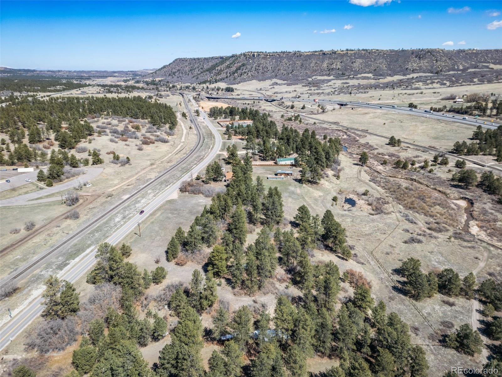 8650 Spruce Mountain Road Larkspur, CO 80118 - Photo 10 of 12 a view of city and ocean