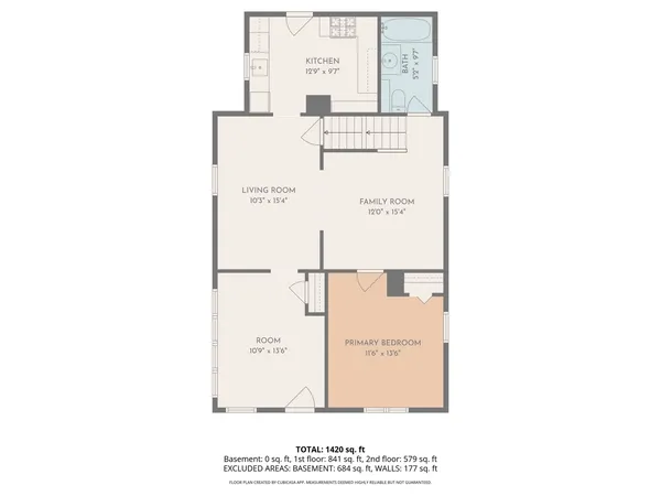 a picture of a bench in front of a wall