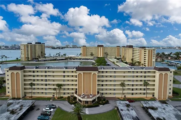 a view of a lake with a yard