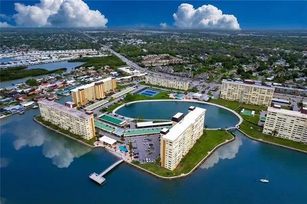 a terrace with outdoor seating and city view