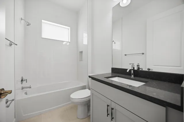 a view of a swimming pool with a yard