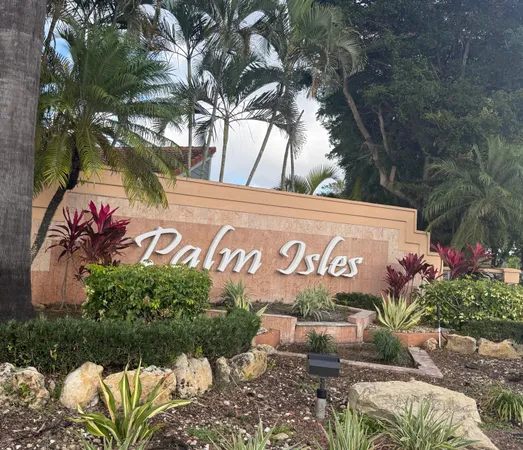 a kitchen with stainless steel appliances kitchen island granite countertop a sink and cabinets