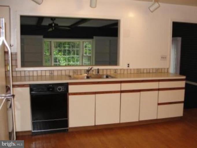1503 Ritchie Street Annapolis, MD 21401 - Photo 7 of 19 Kitchen has a pass through to the family room