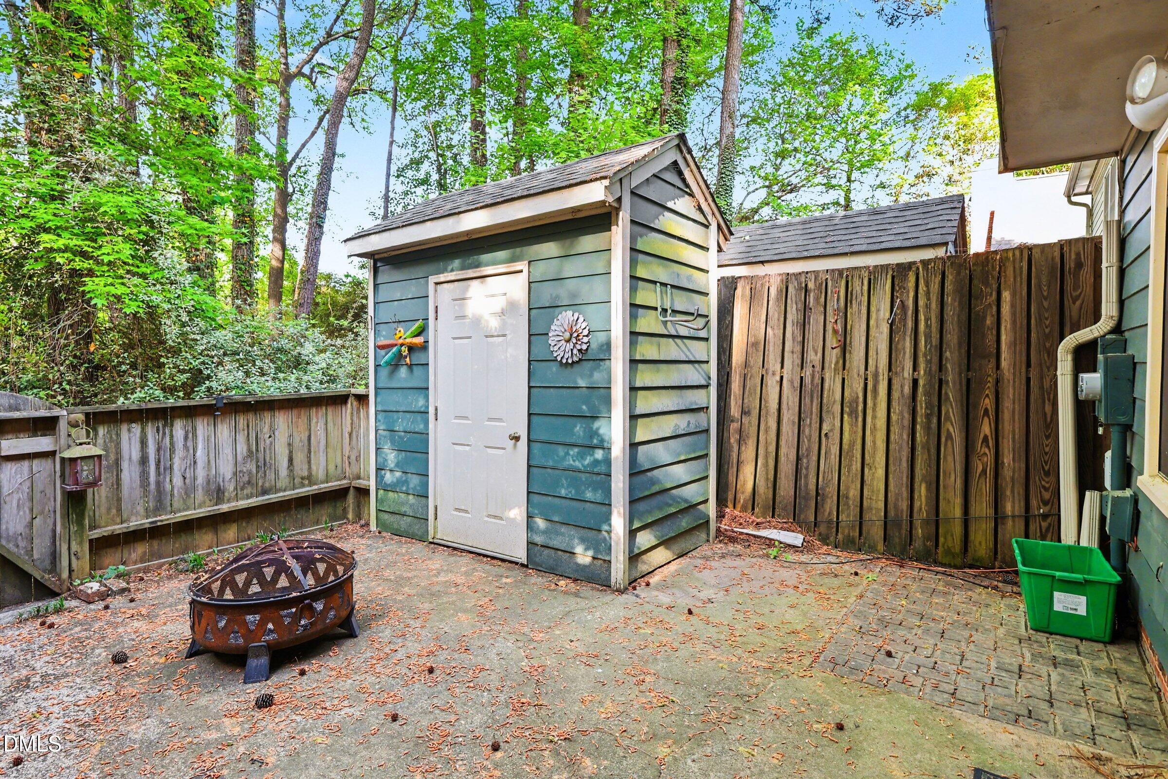 5645 Hamstead Crossing Raleigh, NC 27612 - Photo 26 of 35 a front view of a house with a garden