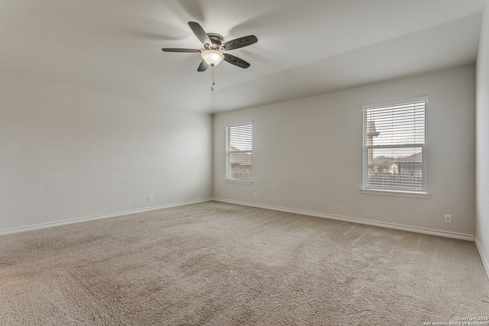 2615 Yaupon Ranch San Antonio, TX 78244 - Photo 14 of 25 an empty room with a empty space and a ceiling fan