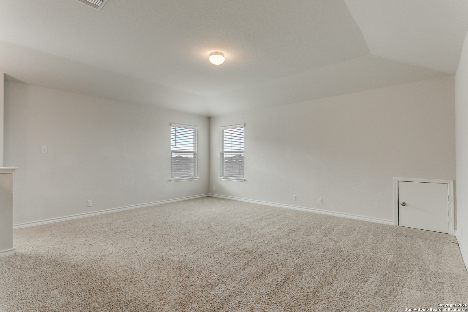 2615 Yaupon Ranch San Antonio, TX 78244 - Photo 18 of 25 a view of an empty room with window and closet area