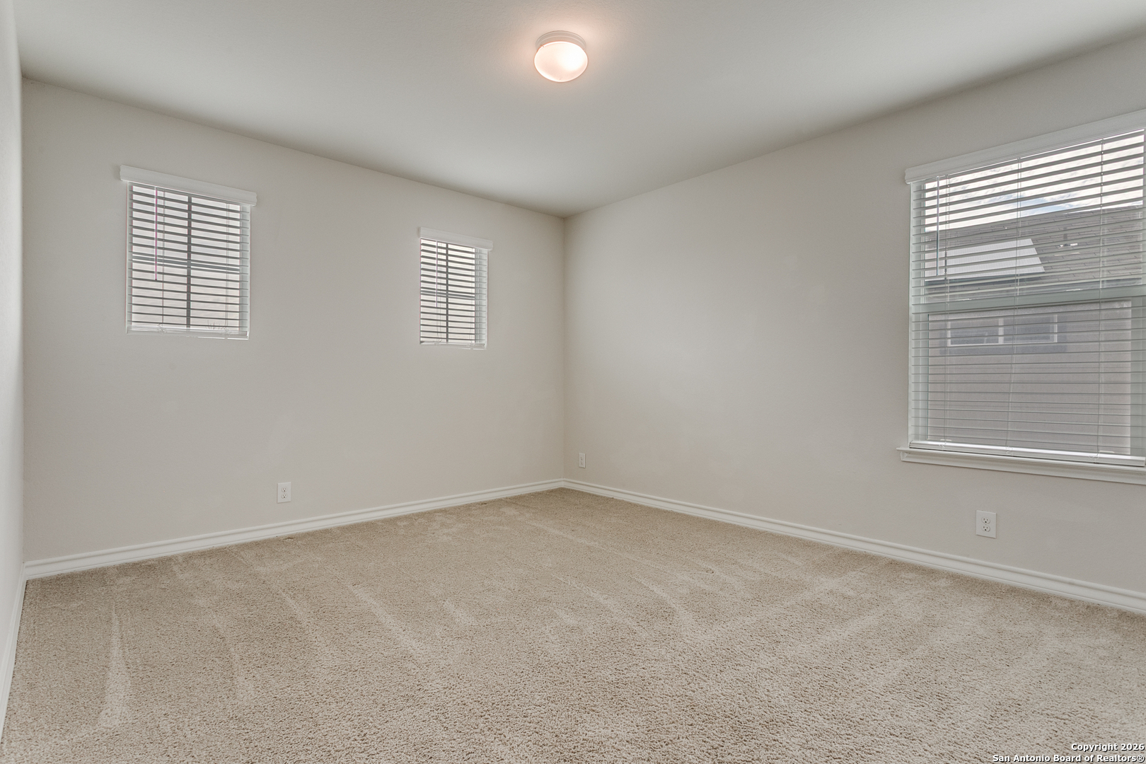 2615 Yaupon Ranch San Antonio, TX 78244 - Photo 19 of 25 an empty room with a window