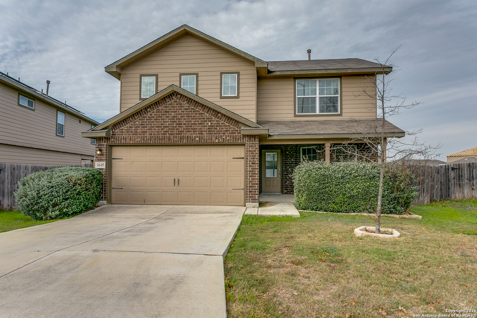 2615 Yaupon Ranch San Antonio, TX 78244 - Photo 2 of 25 a view of a house with a yard and potted plants