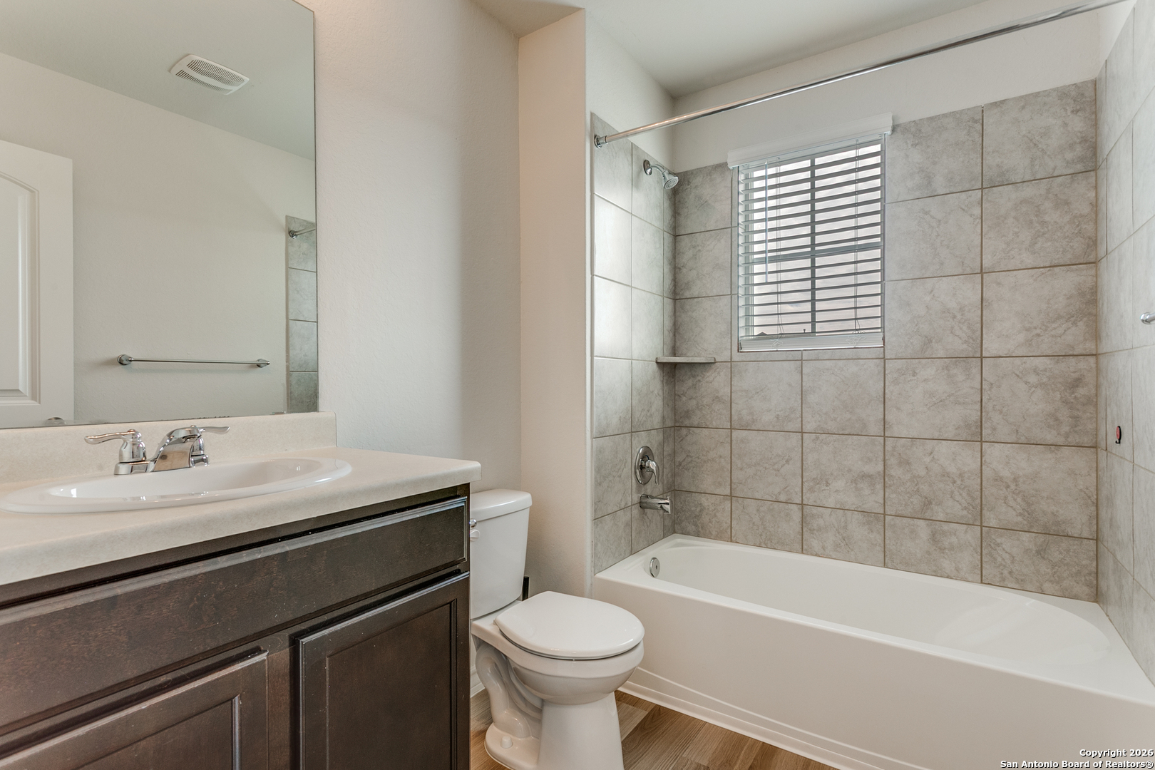 2615 Yaupon Ranch San Antonio, TX 78244 - Photo 22 of 25 a bathroom with a sink a toilet and a bathtub