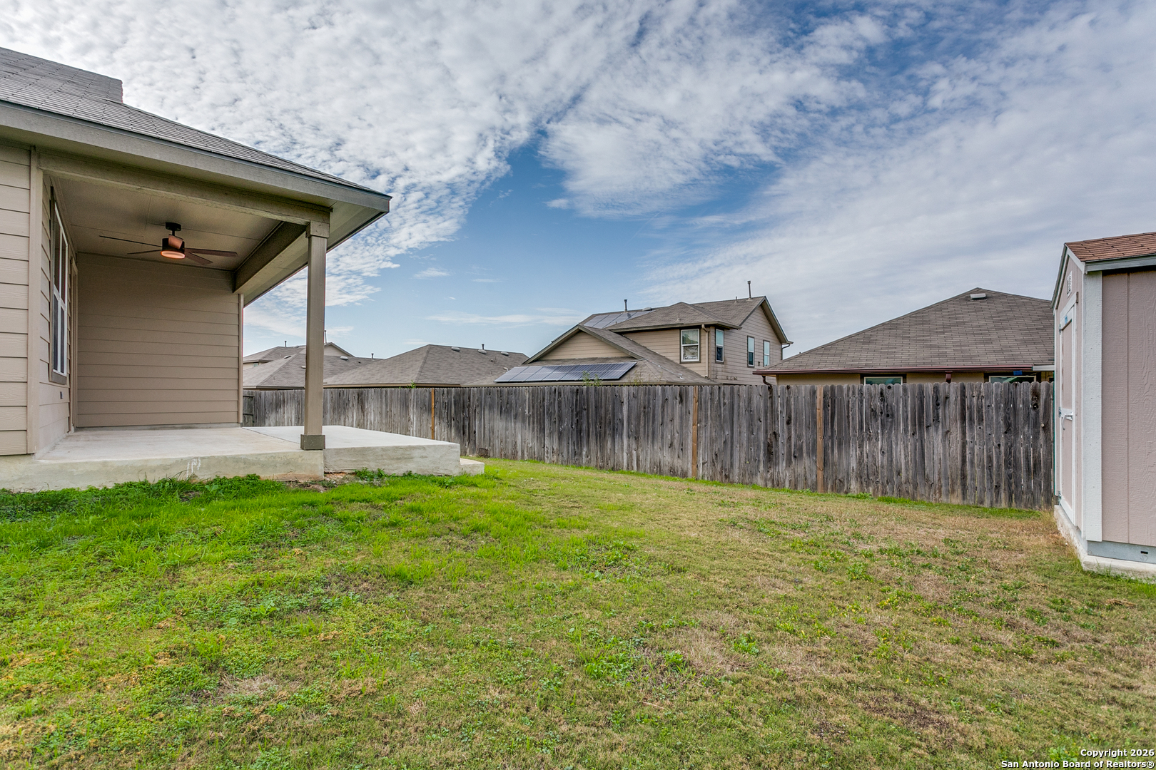 2615 Yaupon Ranch San Antonio, TX 78244 - Photo 23 of 25 a backyard of a house with table and chairs