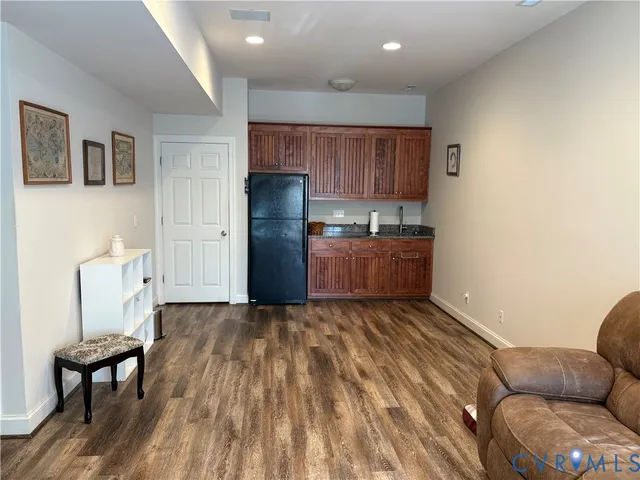 a view of kitchen with livingroom and furniture