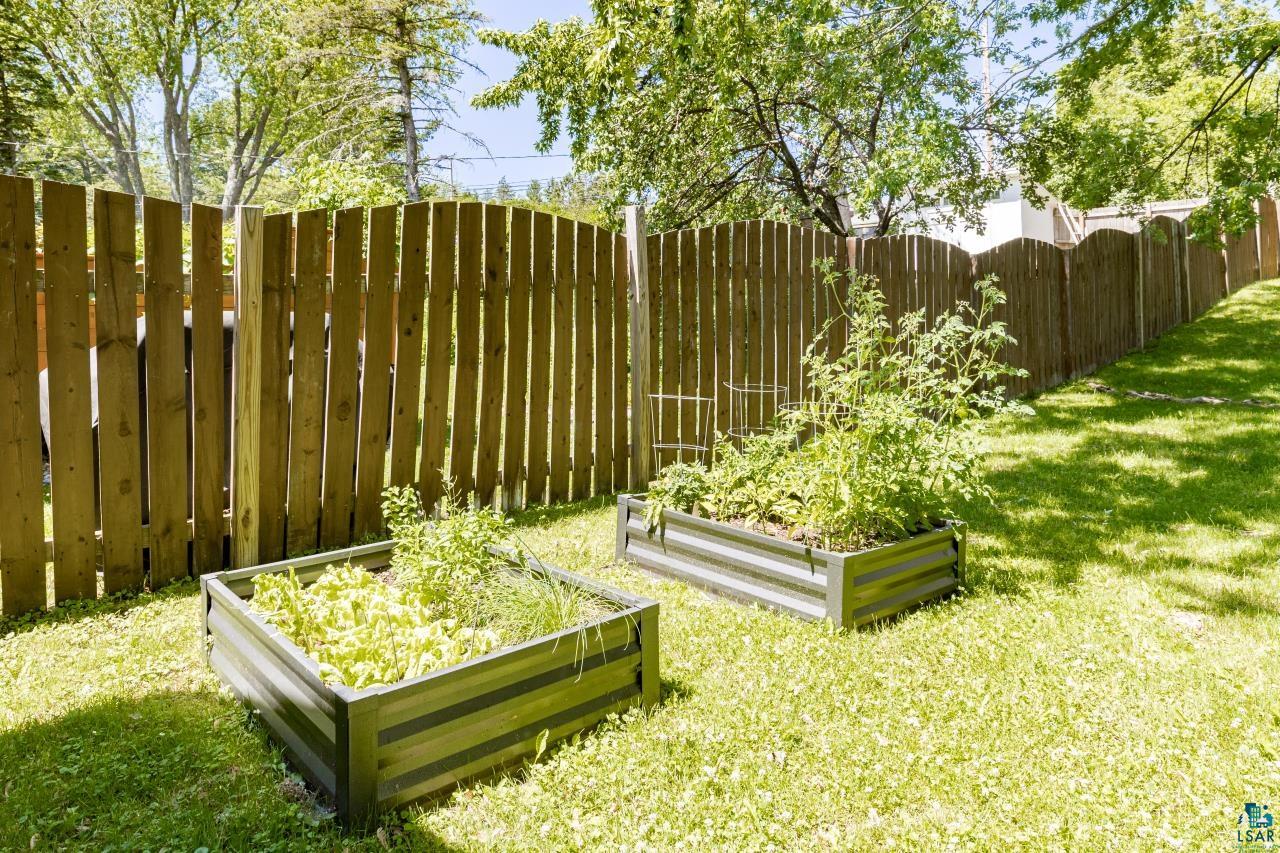4119 Pitt Street Duluth, MN 55804 - Photo 49 of 50 Expansive green lawn with two galvanized steel raised garden beds
