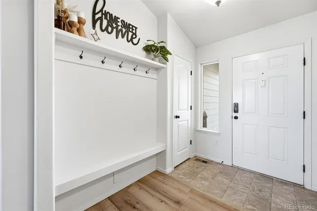 a view of a closet area with entryway