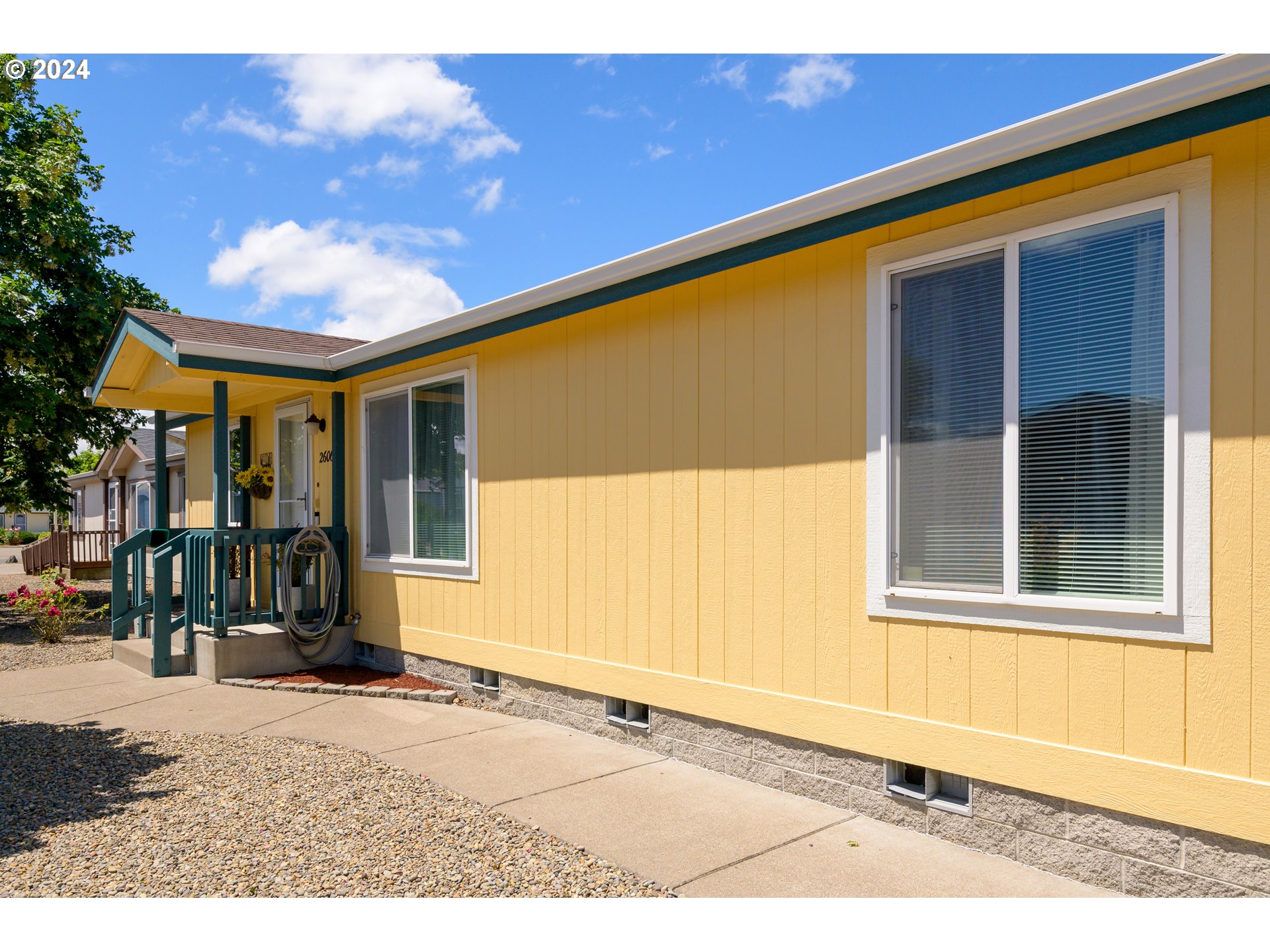 2606 Maia Loop Springfield, OR 97477 - Photo 23 of 29 a view of a house with a patio