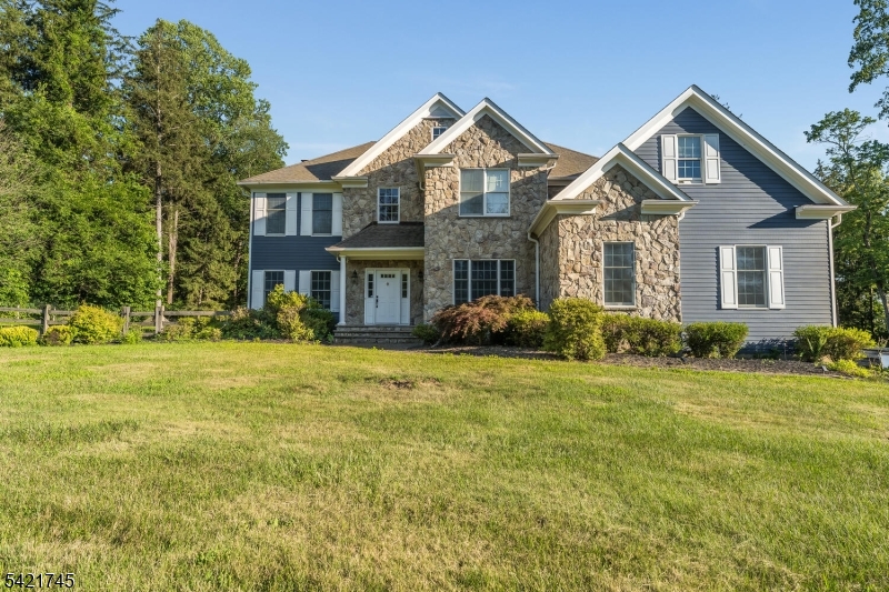 93 Bissell Road Lebanon, NJ 08833 - Photo 2 of 31 a front view of a house with a garden