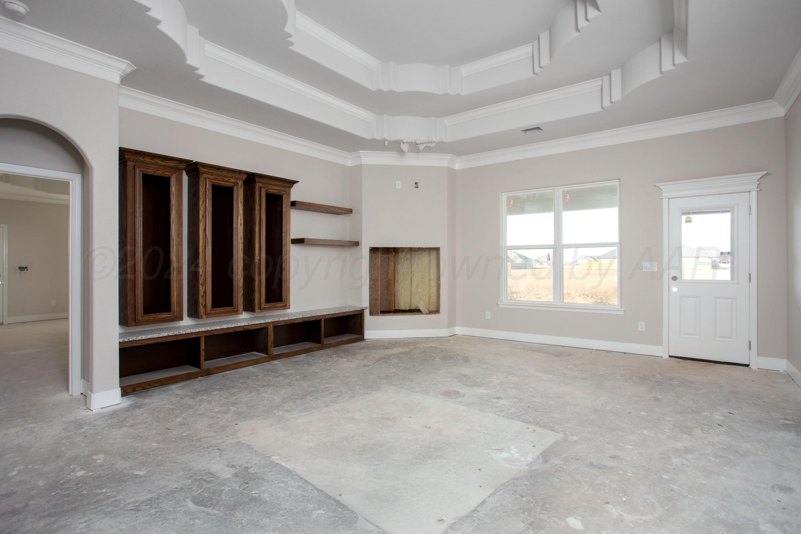 14540 Periwinkle Drive Amarillo, TX 79119 - Photo 12 of 24 an empty room with windows