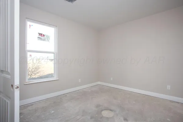 an empty room with a window