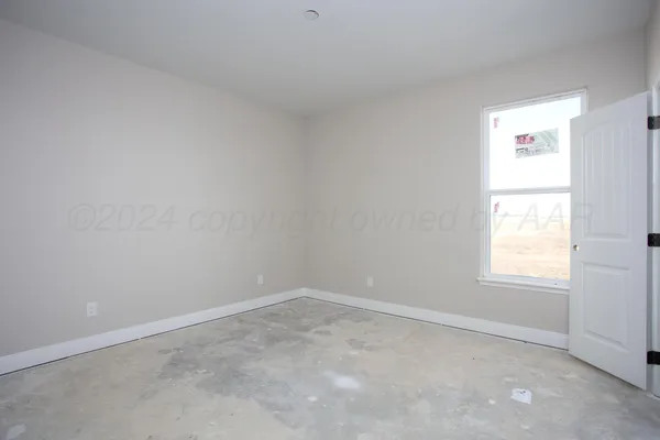 an empty room with a window