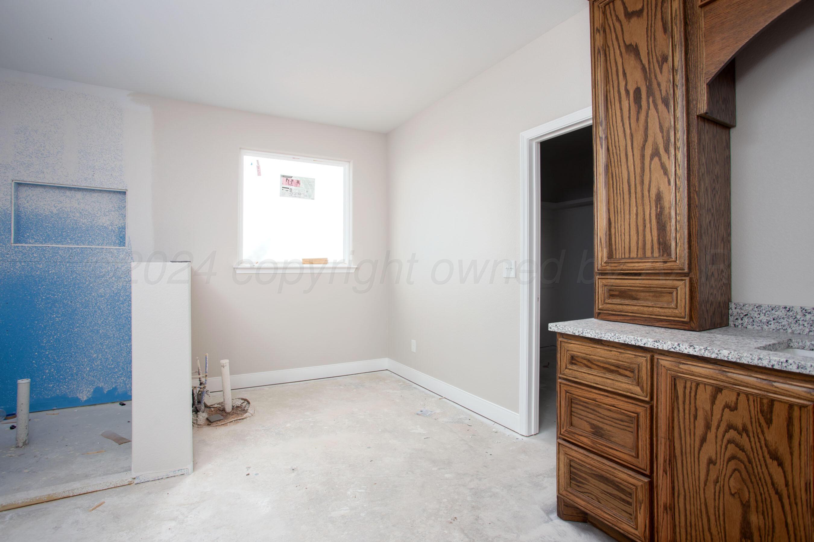 14540 Periwinkle Drive Amarillo, TX 79119 - Photo 22 of 24 wooden floor in an empty room