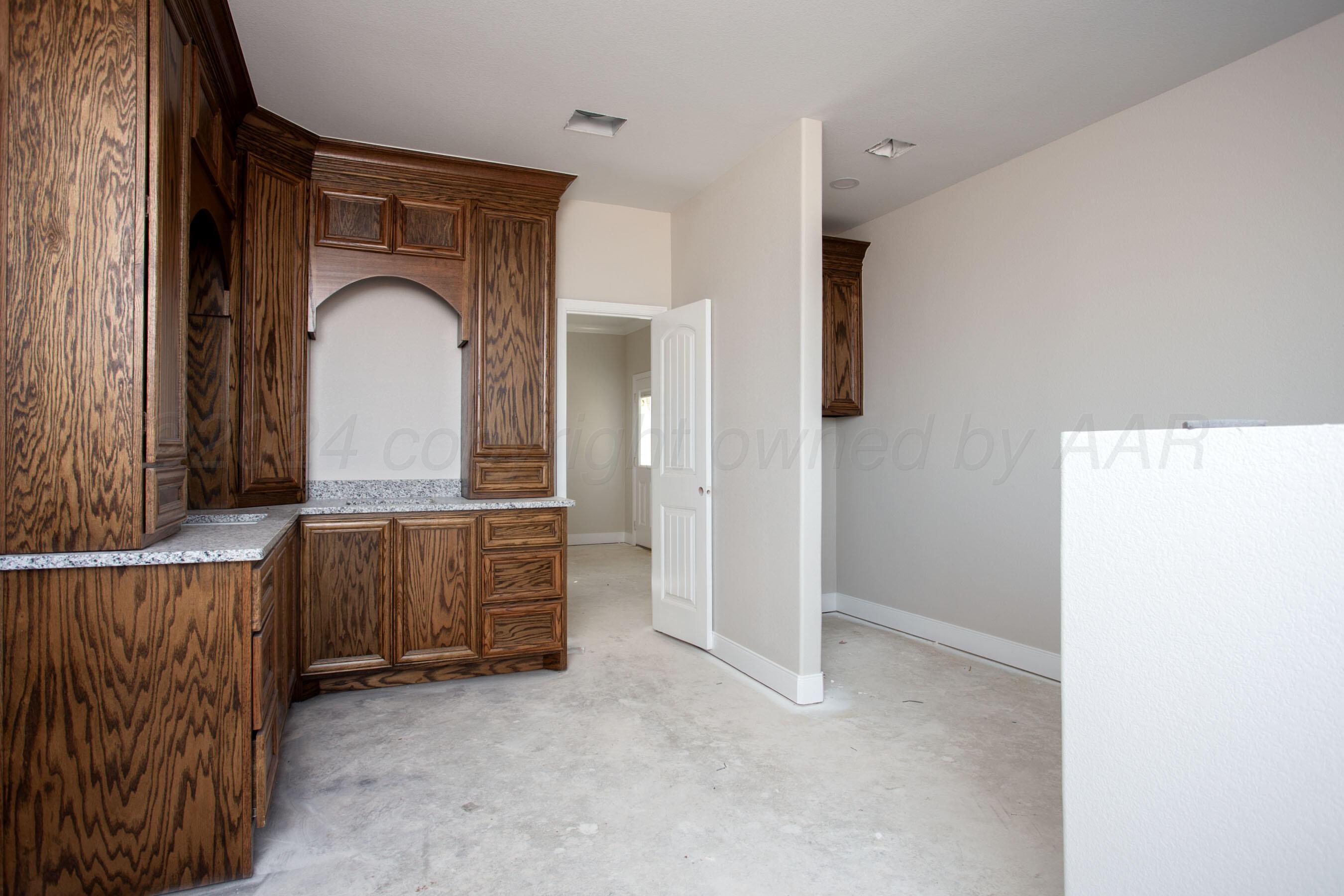 14540 Periwinkle Drive Amarillo, TX 79119 - Photo 6 of 24 wooden floor in an empty room