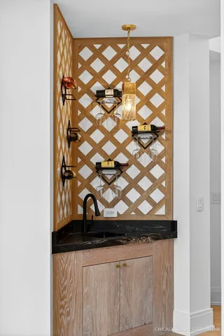 a bathroom with a double vanity sink toilet mirror and bathtub