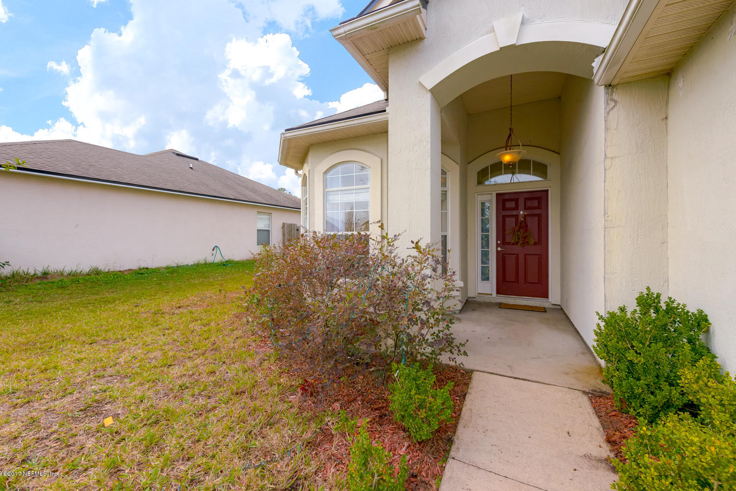 9170 Raptor Drive Jacksonville, FL 32221 - Photo 6 of 31 a front view of house with garden