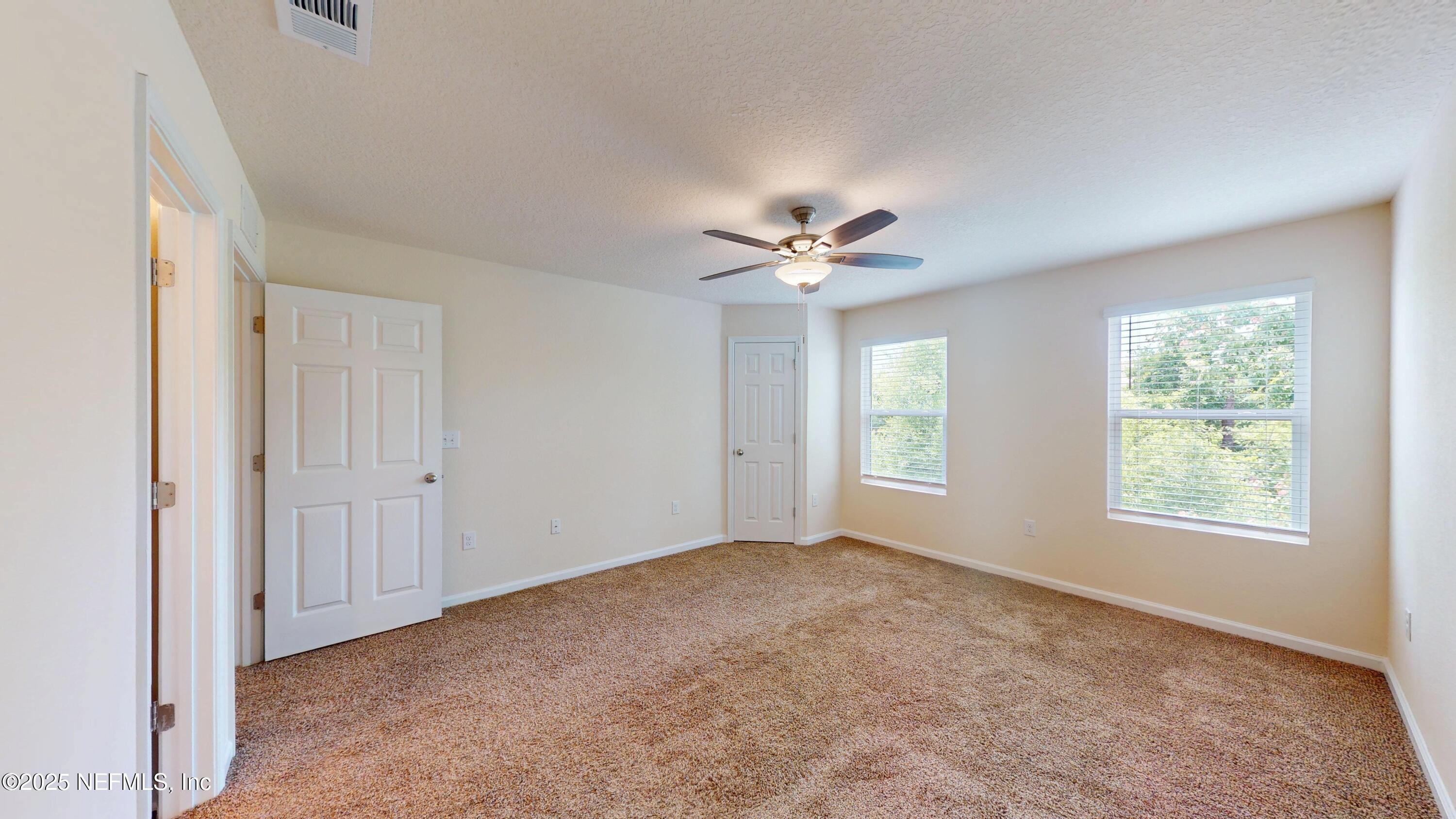 93 Scotch Pebble Drive Jacksonville, FL 32259 - Photo 11 of 27 a view of an empty room with a window