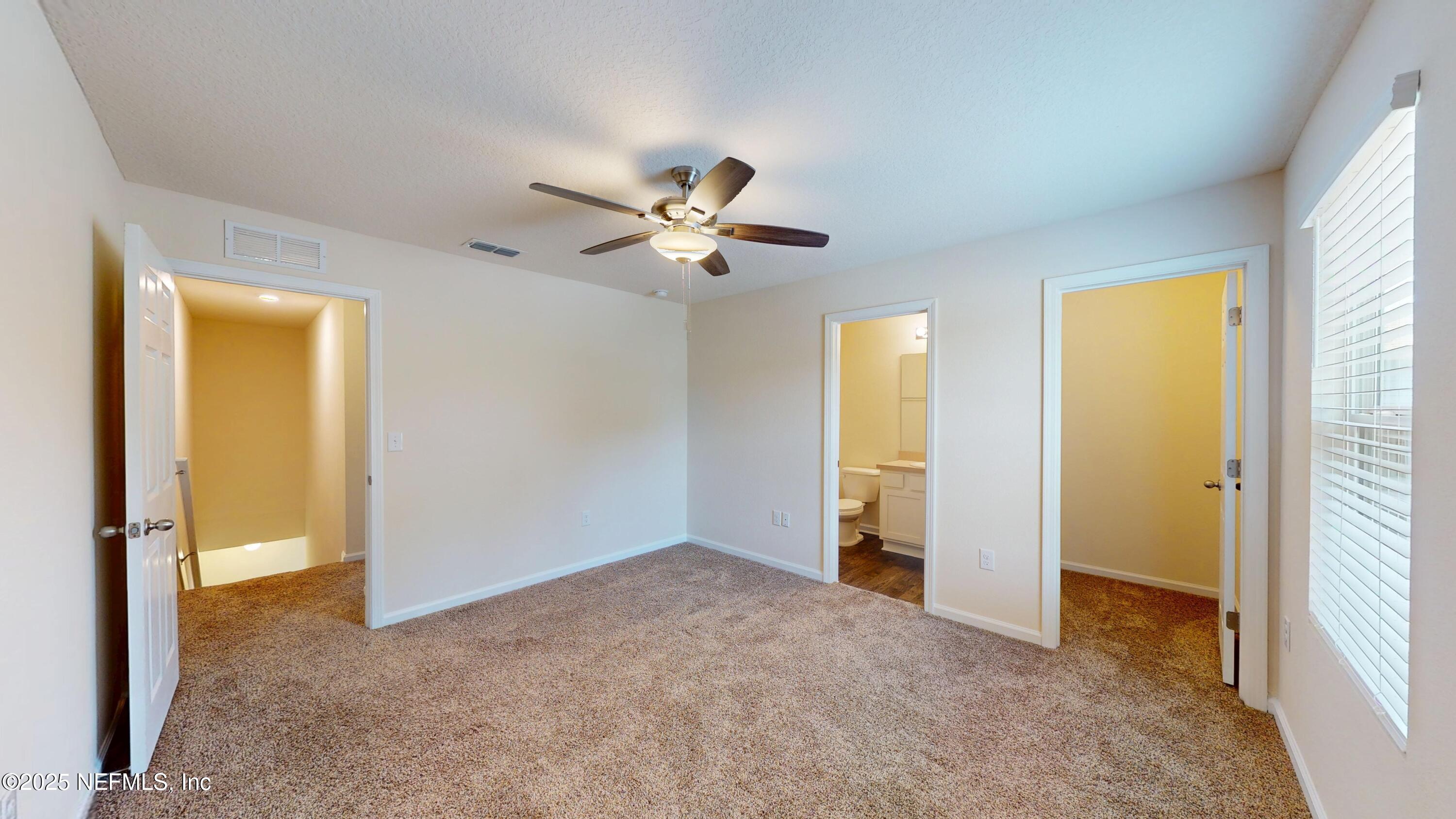 93 Scotch Pebble Drive Jacksonville, FL 32259 - Photo 14 of 27 a view of an empty room with a window