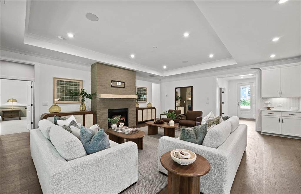 319 Canoe Place Villa Rica, GA 30180 - Photo 11 of 38 a living room with furniture and a fireplace
