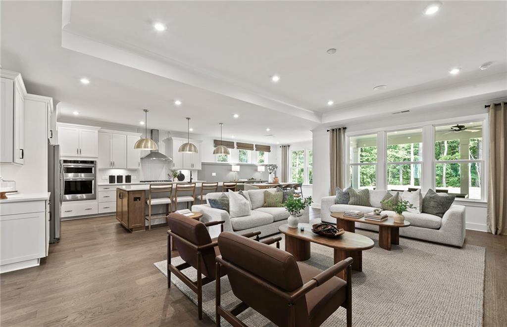 319 Canoe Place Villa Rica, GA 30180 - Photo 12 of 38 a living room with lots of furniture and kitchen view