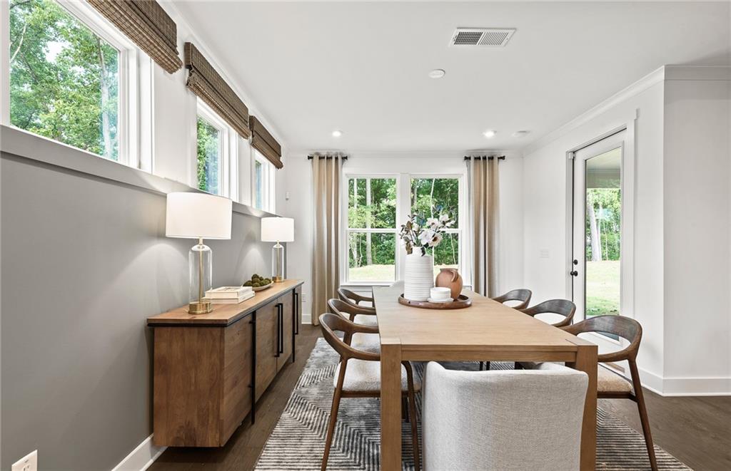 319 Canoe Place Villa Rica, GA 30180 - Photo 17 of 38 a view of a dining room with furniture window and outside view