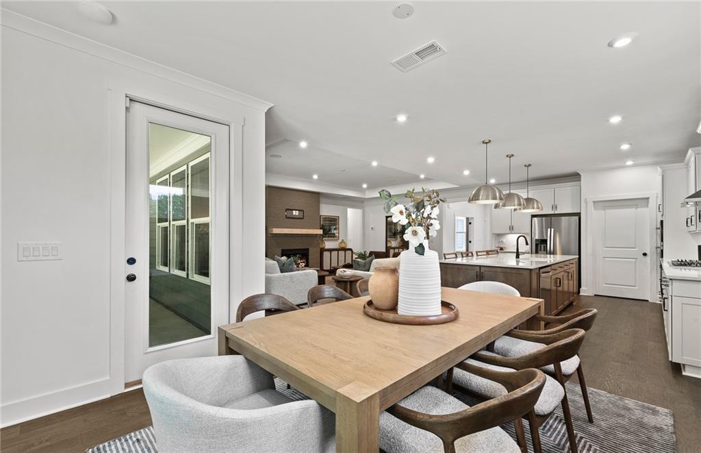 319 Canoe Place Villa Rica, GA 30180 - Photo 19 of 38 a dining room with a table and chairs