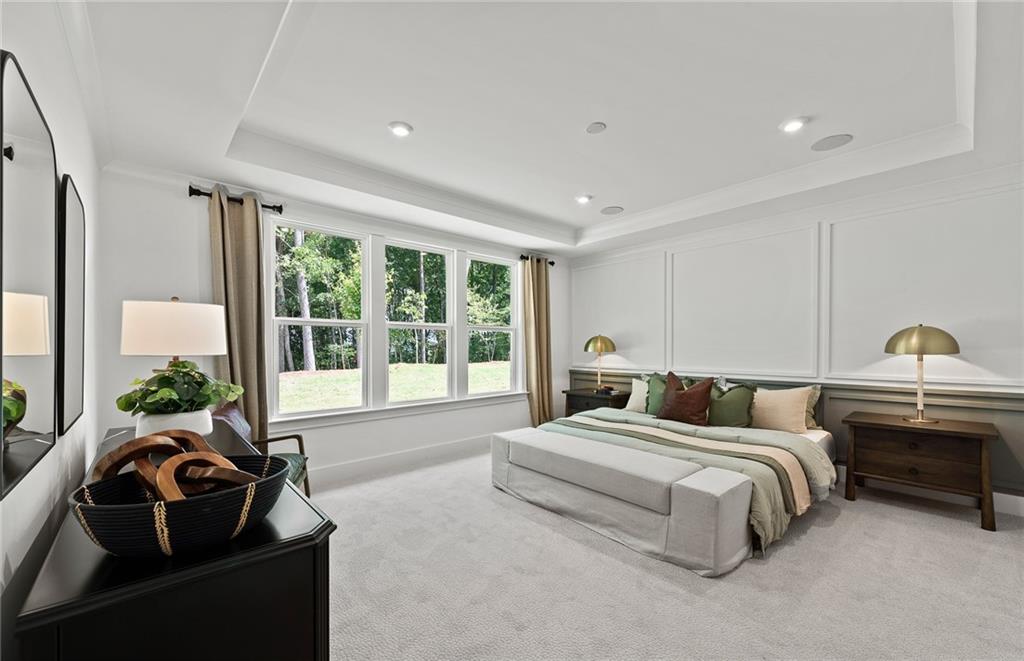 319 Canoe Place Villa Rica, GA 30180 - Photo 26 of 38 a bedroom with bed and a large window