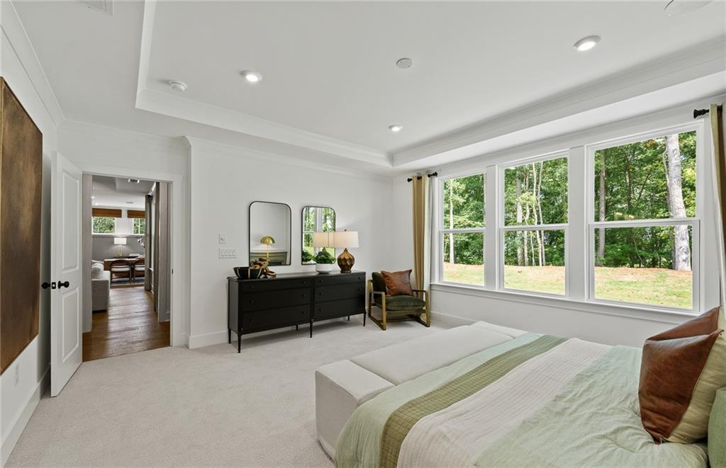 319 Canoe Place Villa Rica, GA 30180 - Photo 27 of 38 a bedroom with a bed and a large window