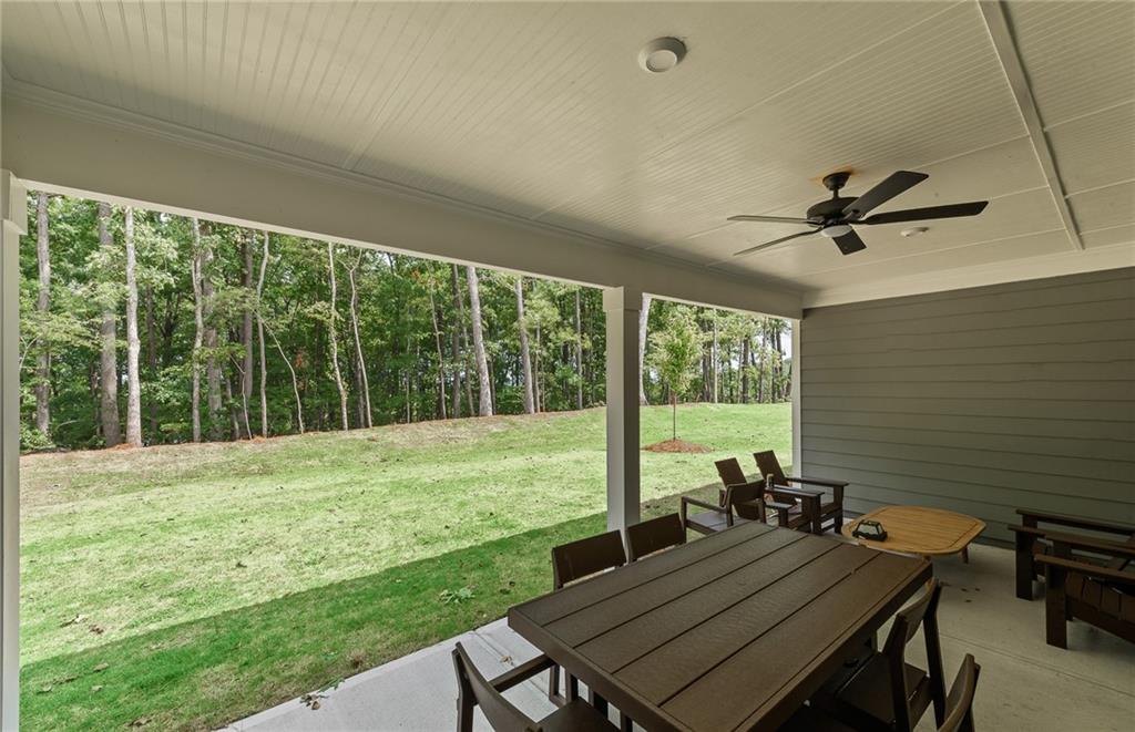 319 Canoe Place Villa Rica, GA 30180 - Photo 35 of 38 a view of a dining room with furniture window and outside view