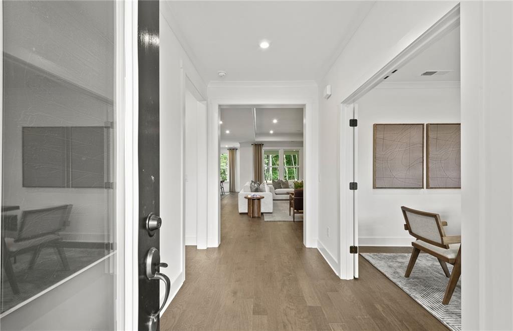 319 Canoe Place Villa Rica, GA 30180 - Photo 4 of 38 a view of a livingroom with furniture and a hallway