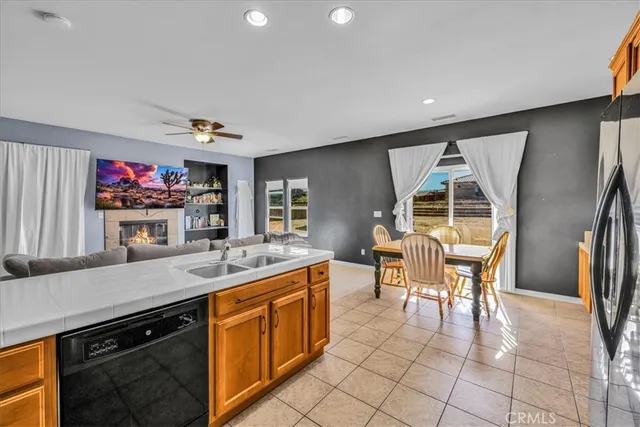 a kitchen with a table and chairs