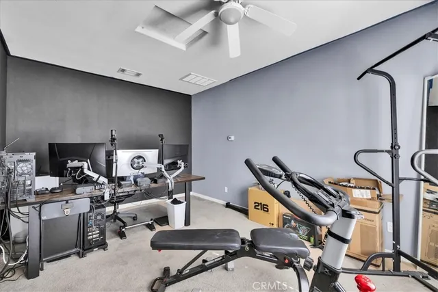 a room with gym equipment and equipment