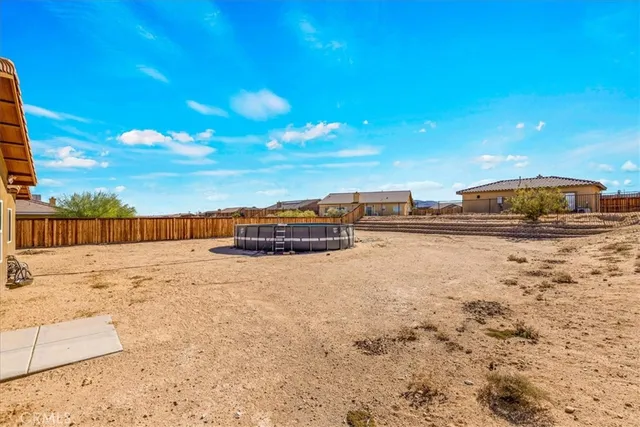 an aerial view of residential houses and city view