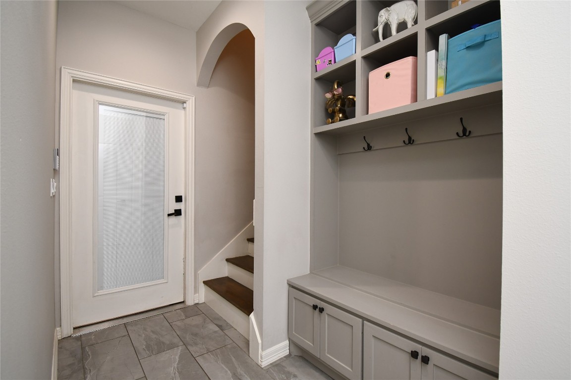 2406 Hummingbird Street New Caney, TX 77357 - Photo 31 of 40 a bathroom with a bathtub and shower