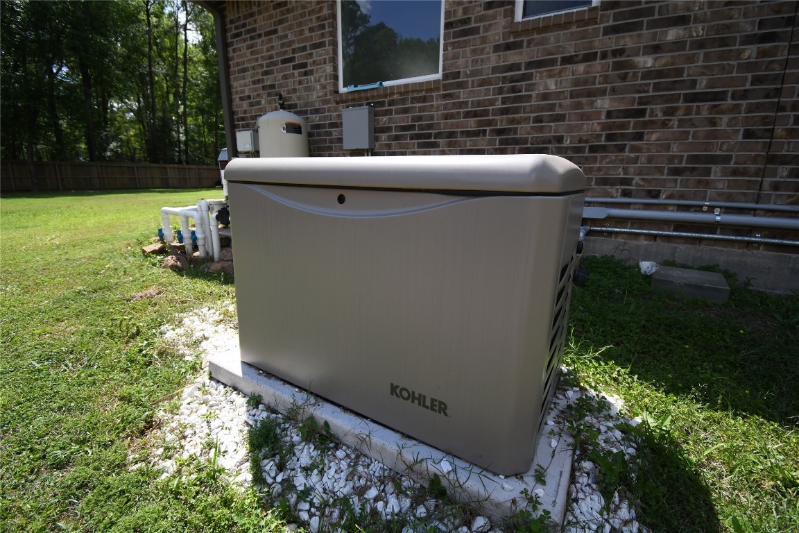 2406 Hummingbird Street New Caney, TX 77357 - Photo 40 of 40 a view of outdoor space and yard