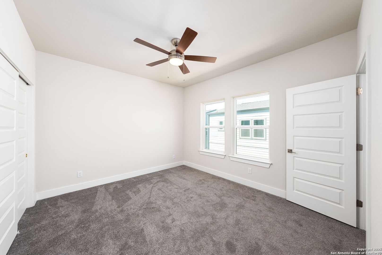 419 Ira Avenue, Unit 1102 San Antonio, TX 78209 - Photo 15 of 28 a view of empty room with ceiling fan