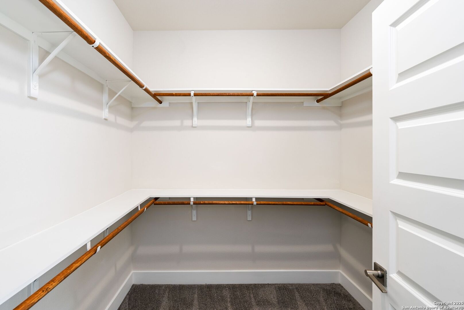 419 Ira Avenue, Unit 1102 San Antonio, TX 78209 - Photo 21 of 28 a view of an empty walk in closet