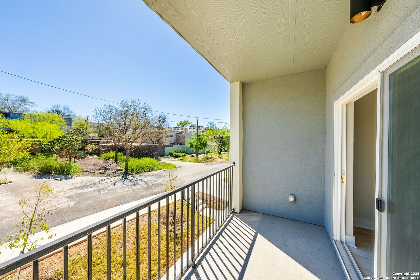 419 Ira Avenue, Unit 1102 San Antonio, TX 78209 - Photo 28 of 28 a view of balcony with wooden floor