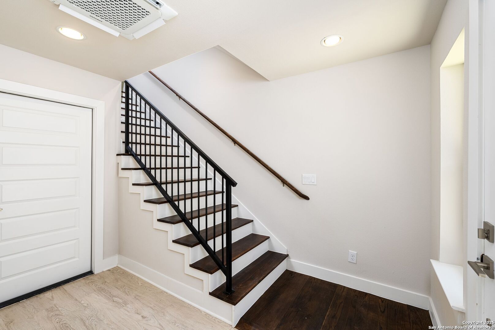 419 Ira Avenue, Unit 1102 San Antonio, TX 78209 - Photo 7 of 28 a view of entryway with wooden floor